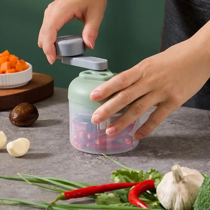 Picador compacto de alimentos con manivela